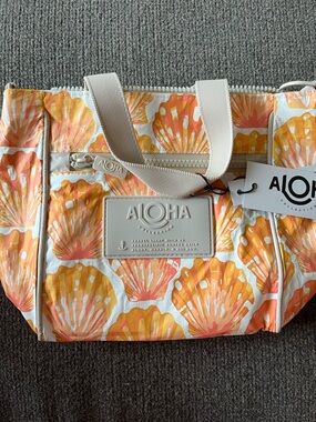 Aloha Collection Sunrise Shell crossbody purse